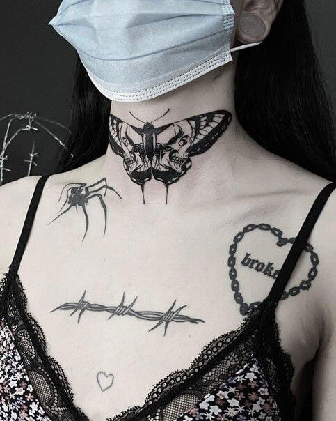 neck tattoo women butterfly