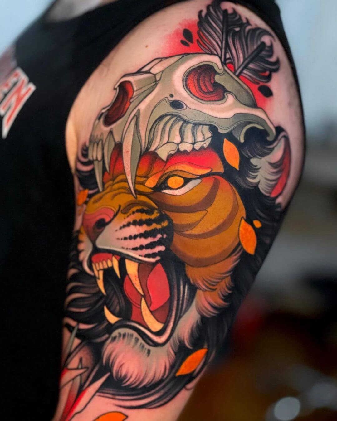 neo traditional tattoo lion with skull.