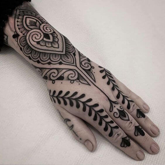 ornamental hand tattoo