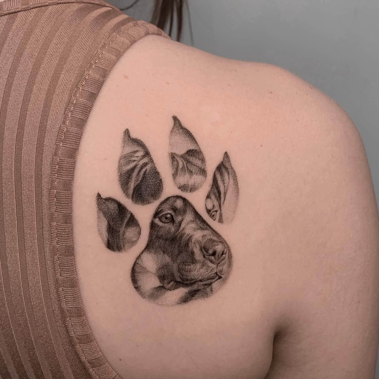 Memorial tattoo of my dog's paw print, 2 days old. Done by Summer at Lucky  Lady in Richmond, Kentucky. : r/tattoos