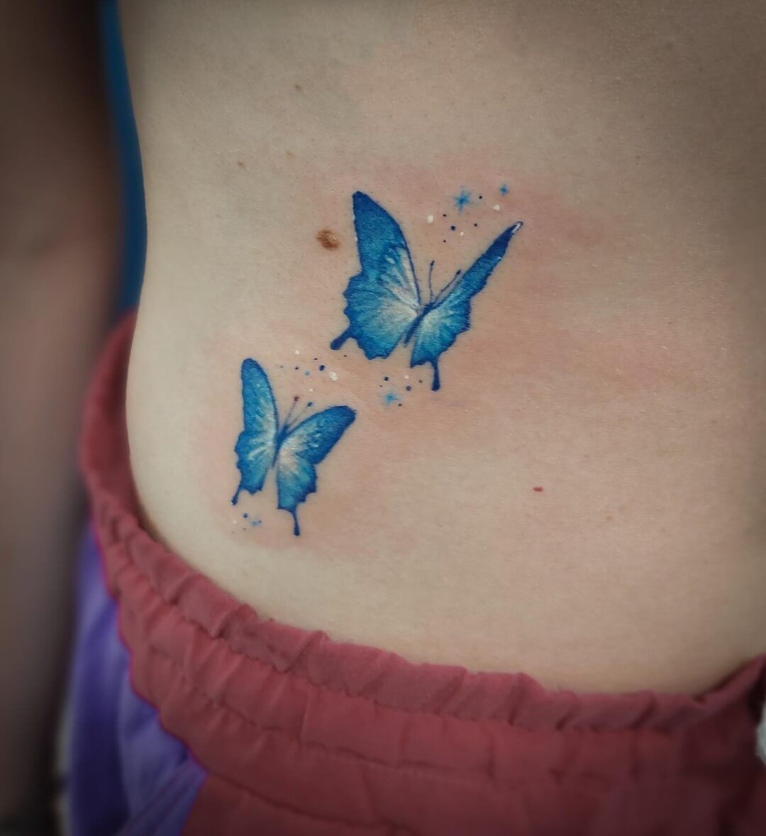 purple and blue butterfly tattoo