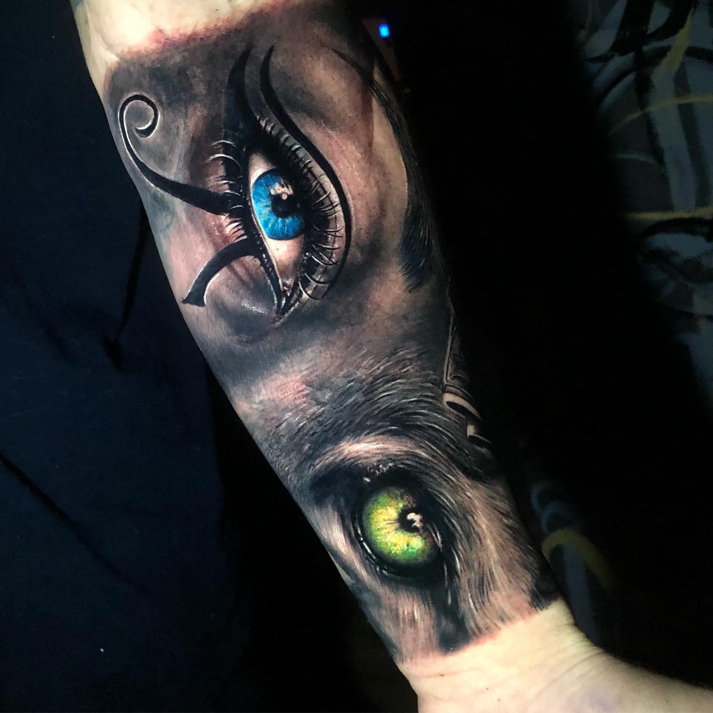 realistic blue eye tattoo