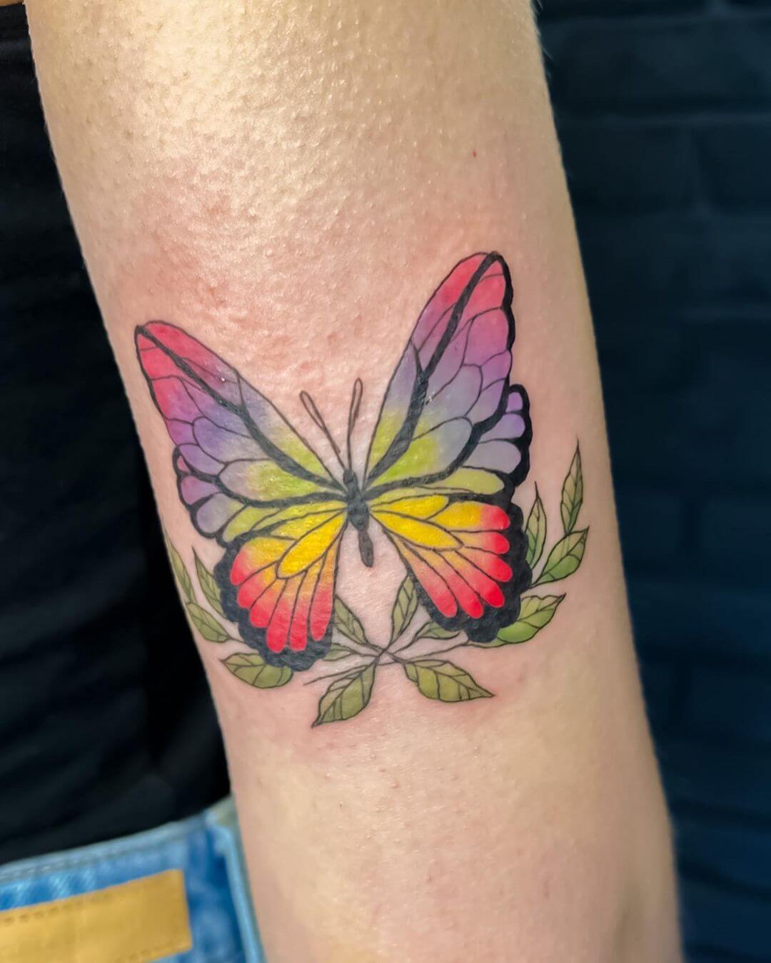 red hand butterfly tattoo