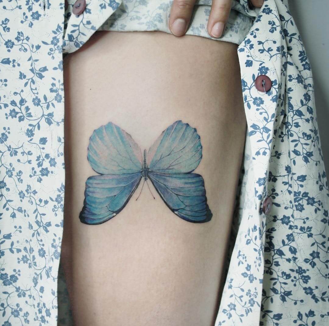 simple blue butterfly tattoo