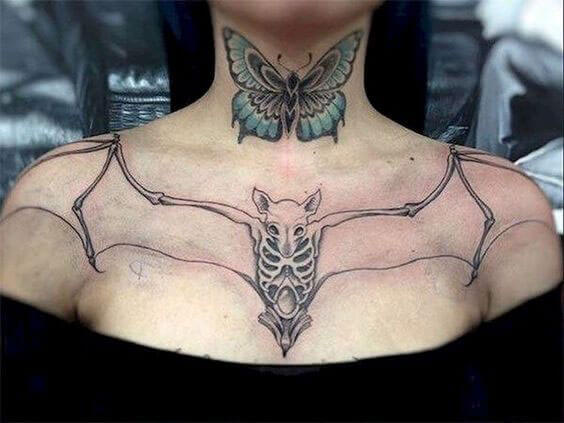 small butterfly neck tattoo
