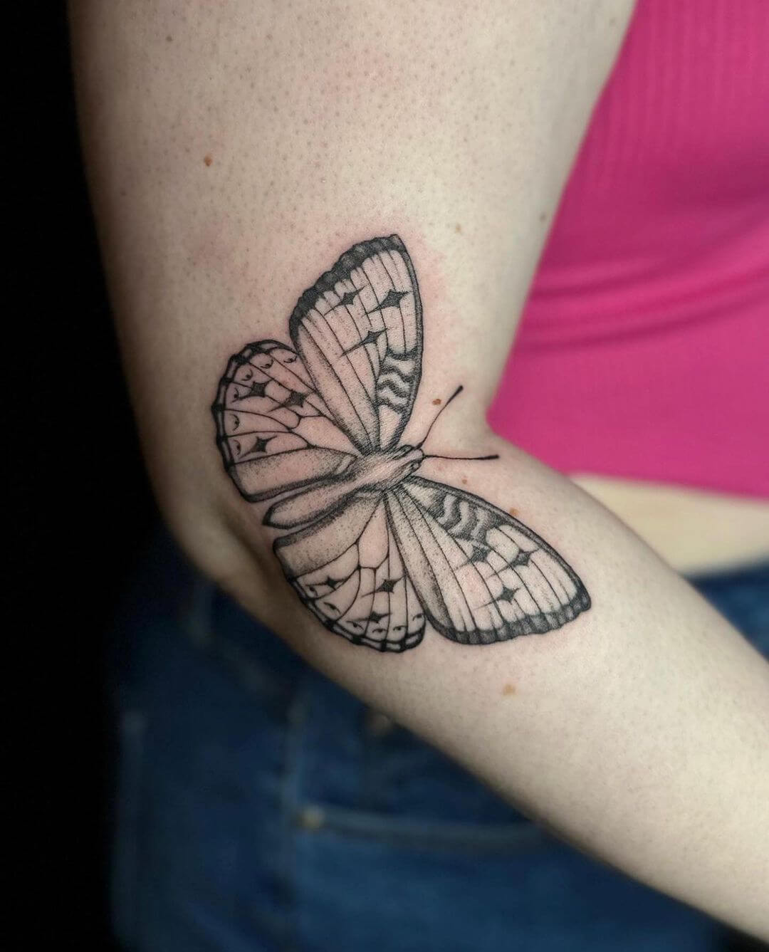 small butterfly tattoo hand