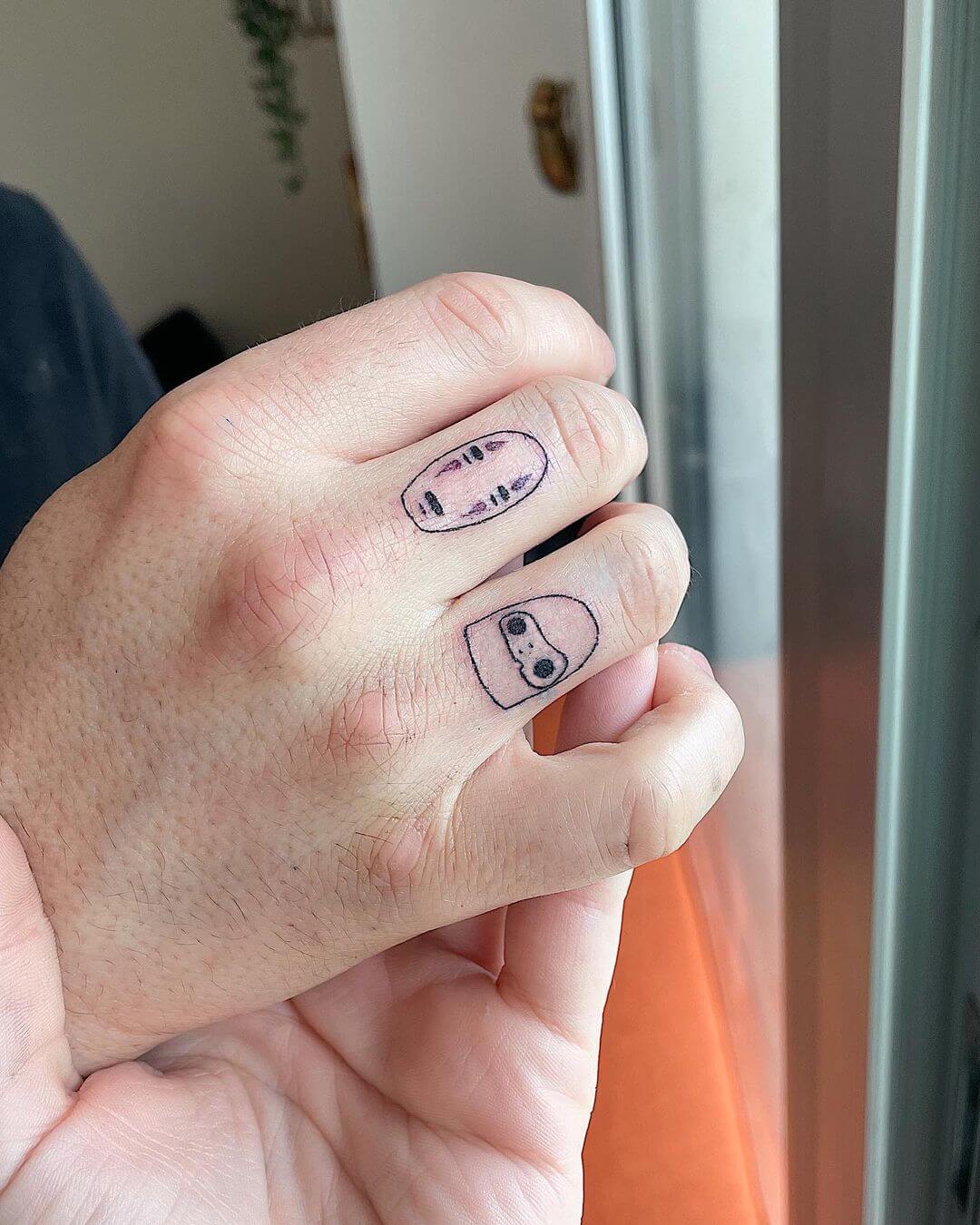 Four tiny finger tattoos for Izzy 💀 | Instagram