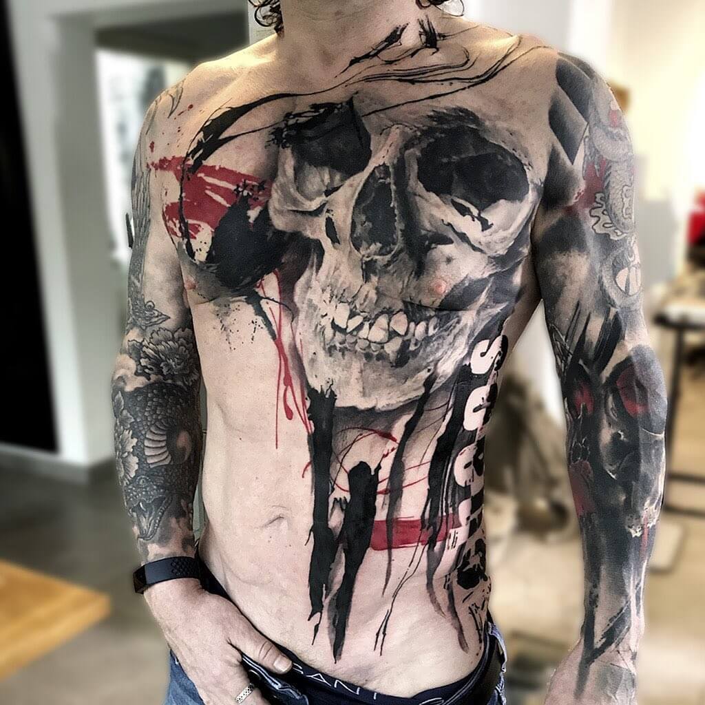 trash polka tattoo skull chest.