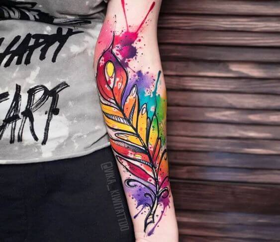 watercolor feather tattoo.